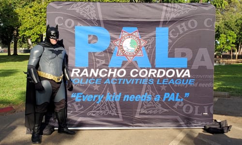 Batman waiting to meet kids at RCPD PAL event