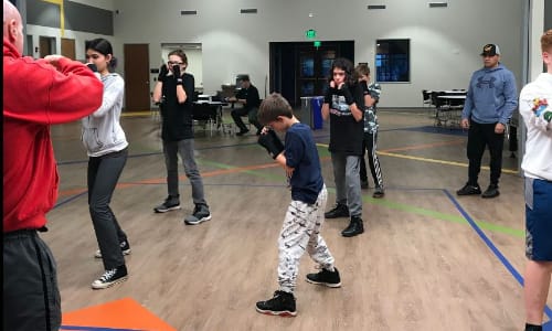 Kids learning to dodge punches