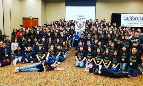 Children posing for a picture for the scholarship program