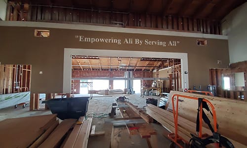 Image of Empowering all by serving all Youth Center wall